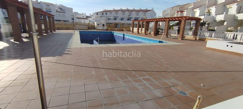 Foto 647989c8-b87c-48e4-9820-12d3e9701814. Casa adossada amb aparcament piscina a Calahonda - Carchuna Motril