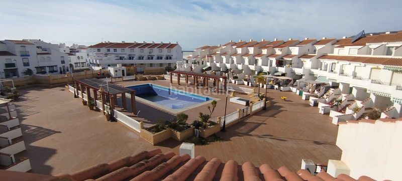 Foto 81f83753-1f51-4418-aca9-0d51bf2d90f9. Casa adossada amb aparcament piscina a Calahonda - Carchuna Motril