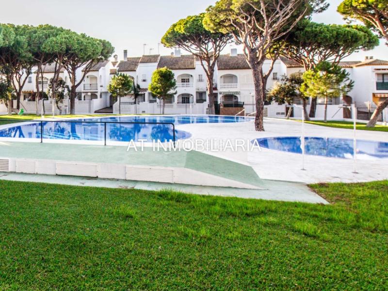 Foto ee515205-2eb7-4fdd-b997-7a0a6bd9e1a6. Reihenhaus mit parking pool in La Barrosa Chiclana de la Frontera