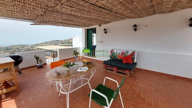 Foto 480c185f-934f-4a2c-a3f4-3255ba39b7d2. Maison avec parking dans Torrox pueblo Torrox