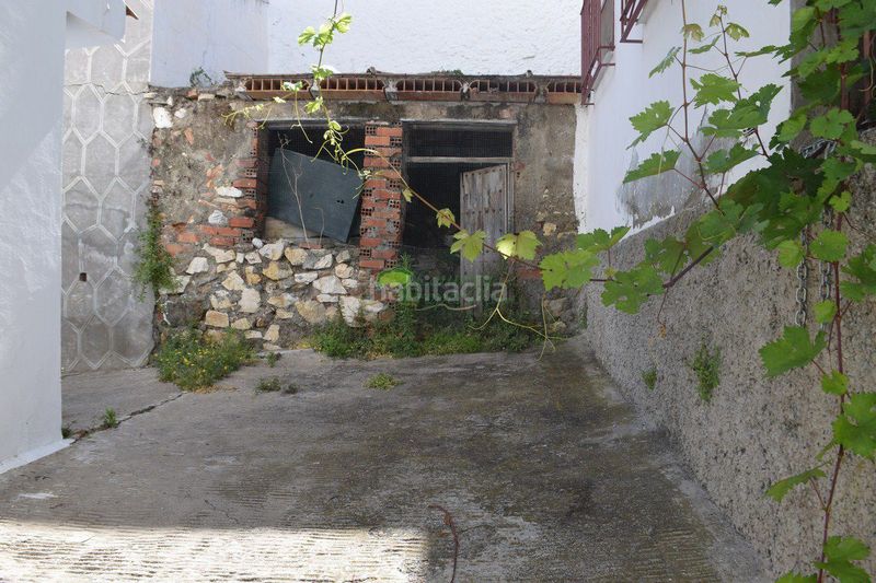 Foto 9b5a594c-43e2-4567-801b-54beeff00f0b. Casa amb aparcament a Cómpeta