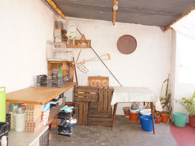 Foto 206c2649-5a85-4fab-a234-96cfd3329b1a. Casa adossada a Benamocarra
