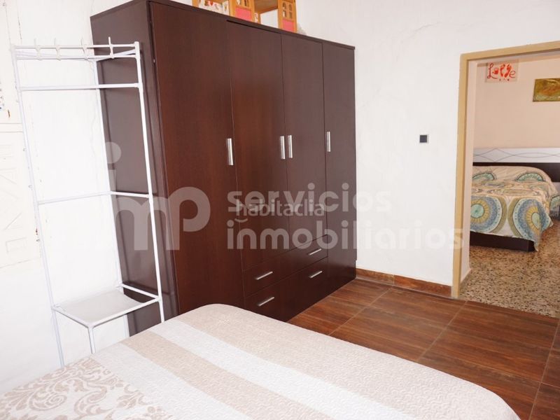 Foto 21c7c8d8-b56b-4571-8bf5-0bbcf6e2af18. Casa adossada a Benamocarra