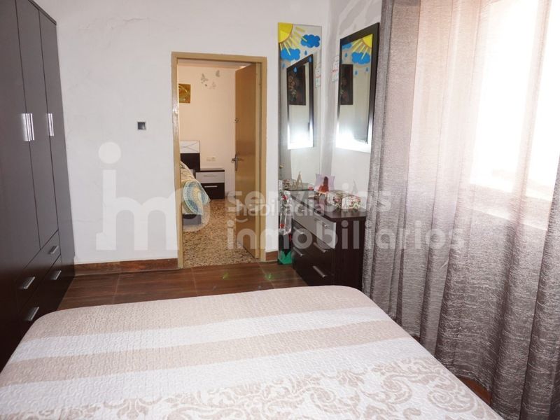 Foto 43c4eb51-cc82-45e3-a142-f80cf45e3f90. Casa adossada a Benamocarra