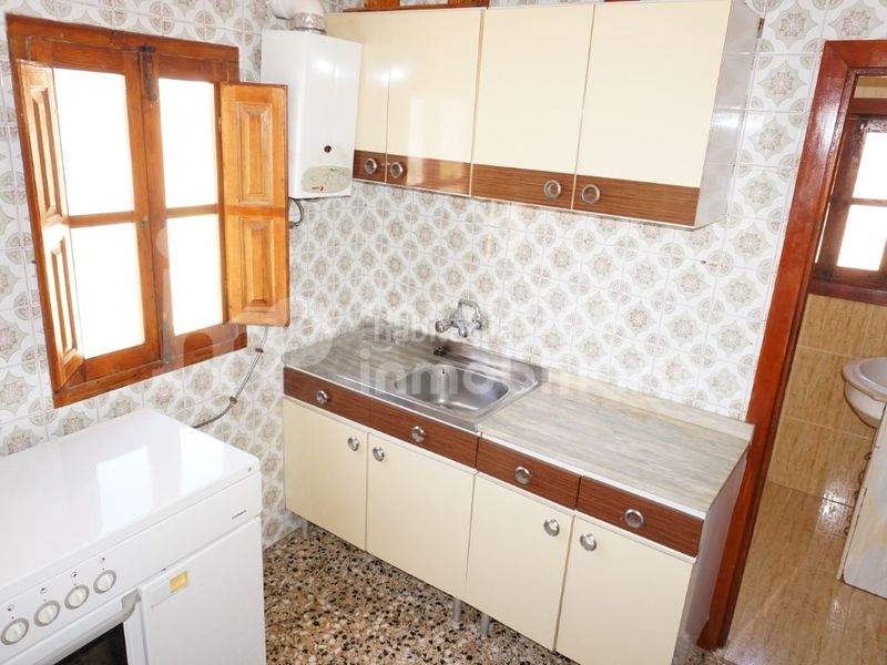 Foto 58a2bf12-572c-4eff-979d-452e10a3e927. Casa adossada a Benamocarra