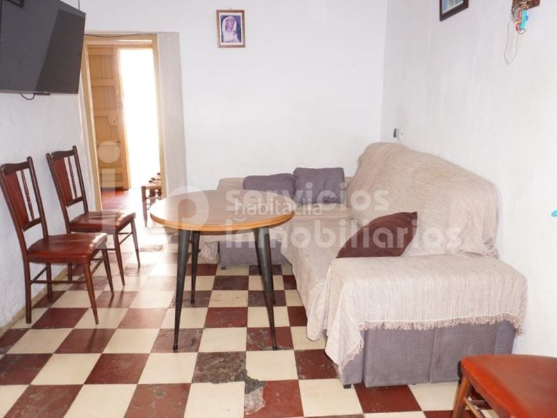 Foto 89bb0c16-c327-4127-995f-b5c3ec37584d. Casa adossada a Benamocarra