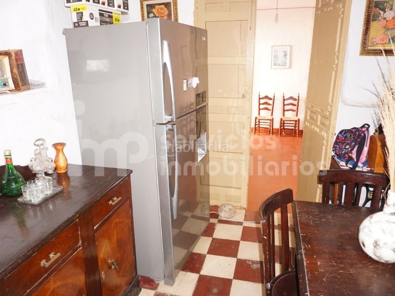 Foto 8c1f4d4d-ea75-47b9-9dd8-fc40698200a3. Casa adossada a Benamocarra