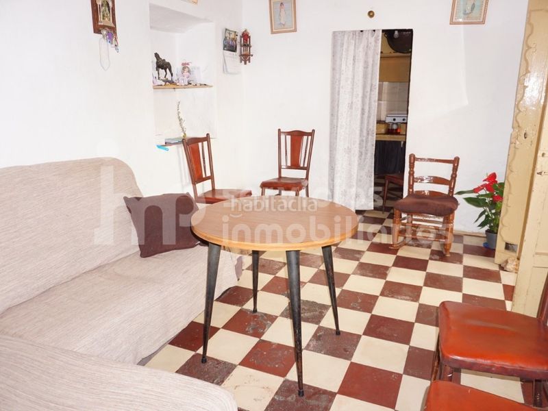 Foto 9189c52f-38f4-48d0-a0dd-d8270e09c565. Casa adossada a Benamocarra