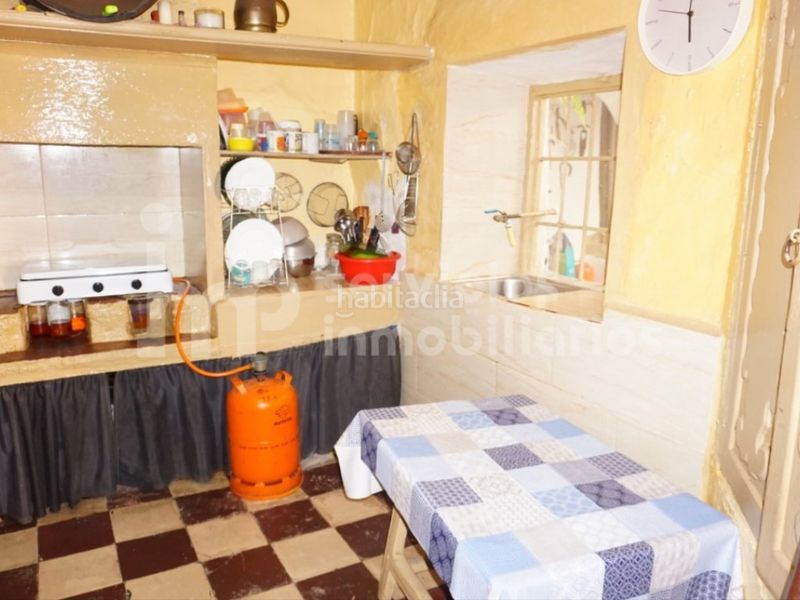 Foto a93c86dd-4844-411e-8371-d6a1a6198d67. Casa adossada a Benamocarra