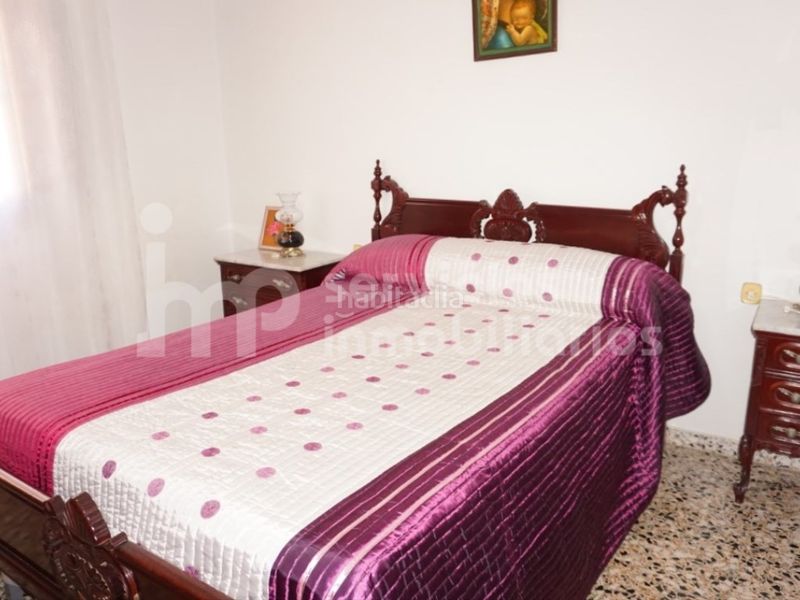 Foto ace5f06d-1001-4e12-8dd8-8f8bc03062d2. Casa adossada a Benamocarra