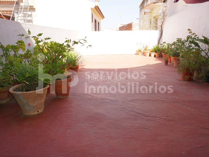 Foto b482328b-a471-4616-959b-892e3f4d5a44. Casa adossada a Benamocarra