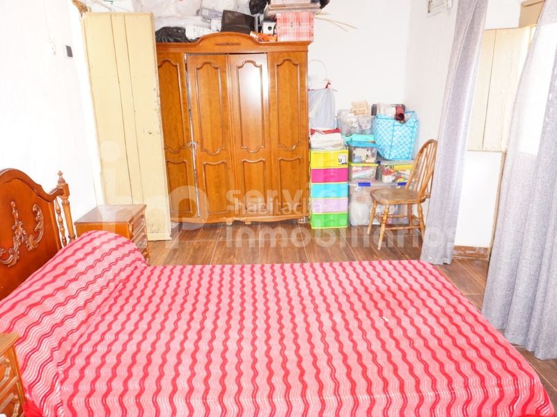 Foto b5f508dc-e571-49ef-a10b-53b78face8e6. Casa adossada a Benamocarra