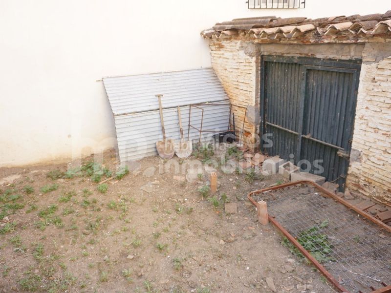 Foto bf58073f-2e9b-4436-b047-cb2903a15feb. Casa adossada a Benamocarra