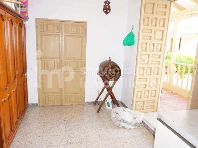 Foto cc581ede-60e6-4120-bcdc-3f5185a6ee64. Casa adossada a Benamocarra