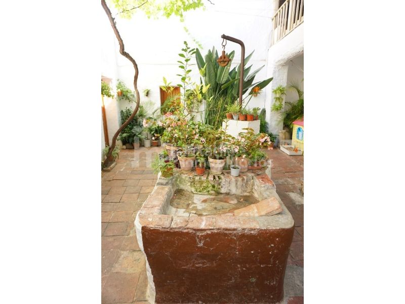 Foto f8057b33-41a9-4eb6-aa53-3eb1c28a0802. Casa adossada a Benamocarra