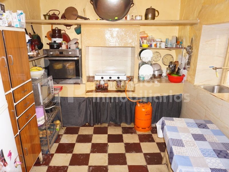 Foto fdecb5e2-6c4e-47d8-80a9-2d703645b415. Casa adossada a Benamocarra