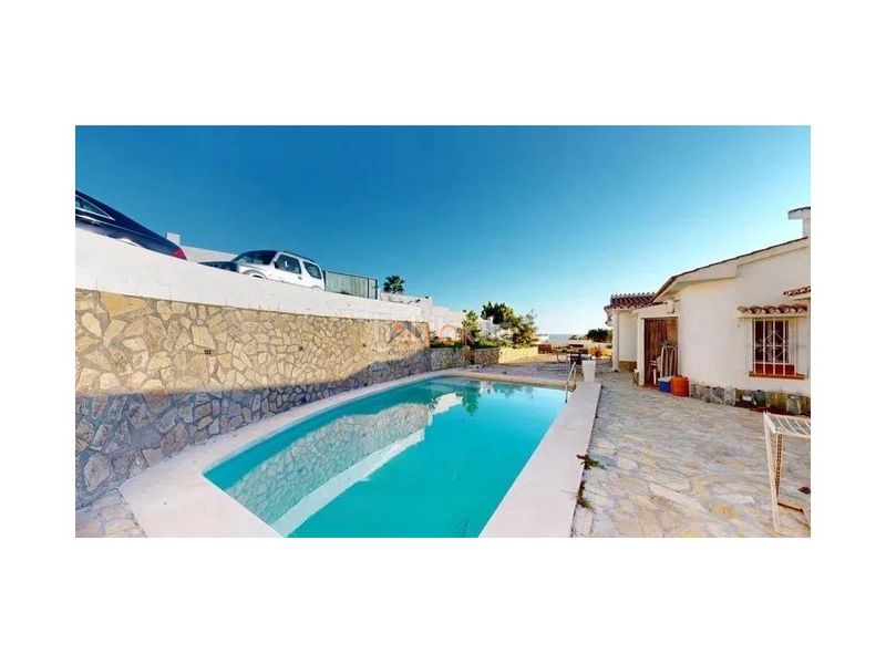 Foto 745ea919-a266-4289-b6e6-c9399386923d. Casa amb aparcament a Benajarafe