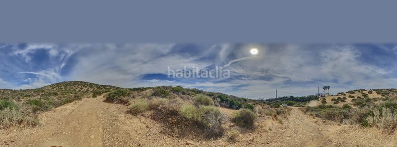 Foto 40f59aeb-d948-4dcd-81bc-de52ea34c073. Rural plot in calle jineta in El Faro de Calaburra - Chaparral Mijas