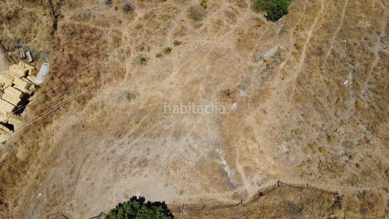 Foto fdf57233-97d3-4f86-8645-bf66286e293f. Fondo rustico in camino del piojo in La Capellanía - El Higuerón Benalmádena