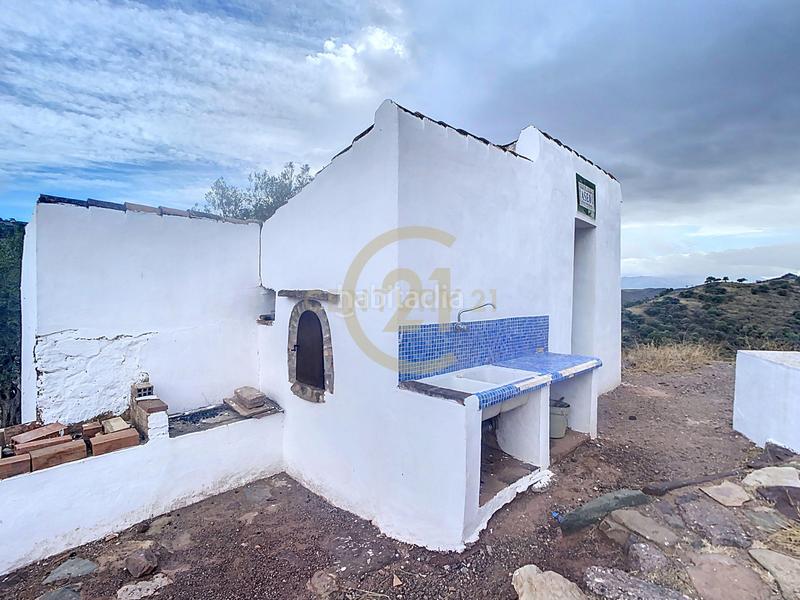 Foto 3ff018e5-7648-456a-bcd1-fb29dc30252b. Casa in poligono in El Cortijuelo Málaga