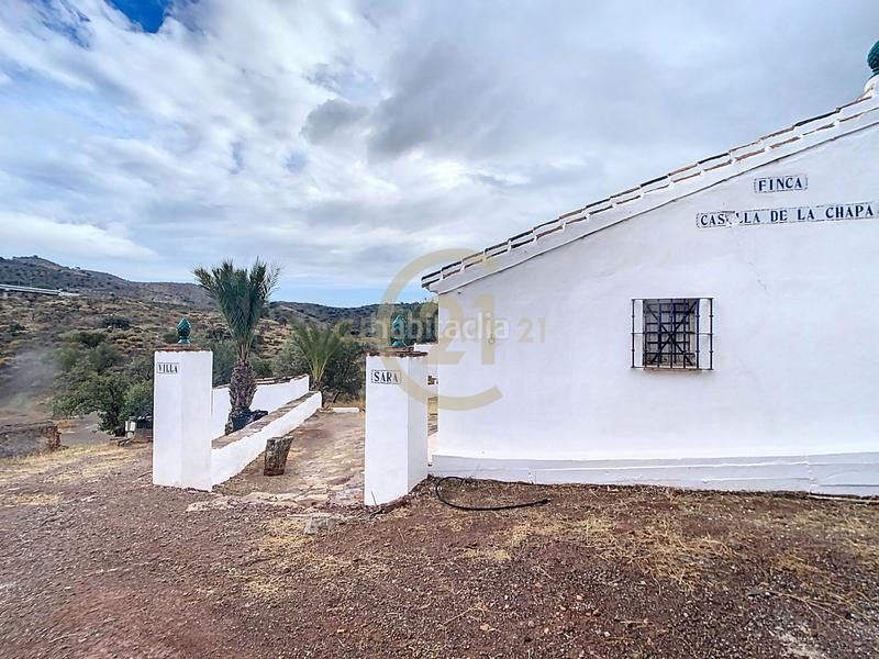 Foto 4d1f4edd-ff96-4936-aefe-38e0b261bf64. Casa in poligono in El Cortijuelo Málaga