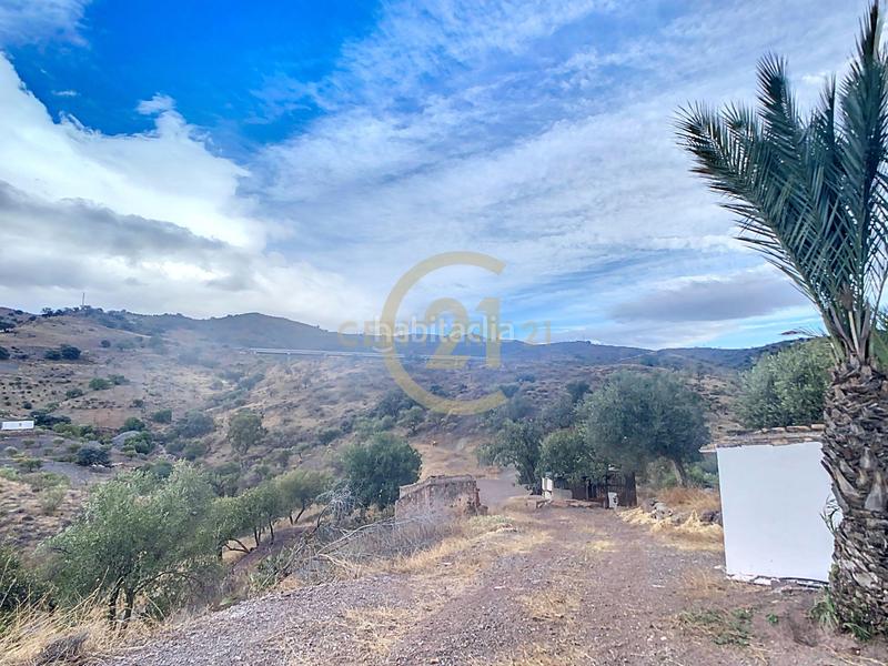 Foto c89405a1-084f-4d60-a819-0ca5bc28fbd6. Casa in poligono in El Cortijuelo Málaga