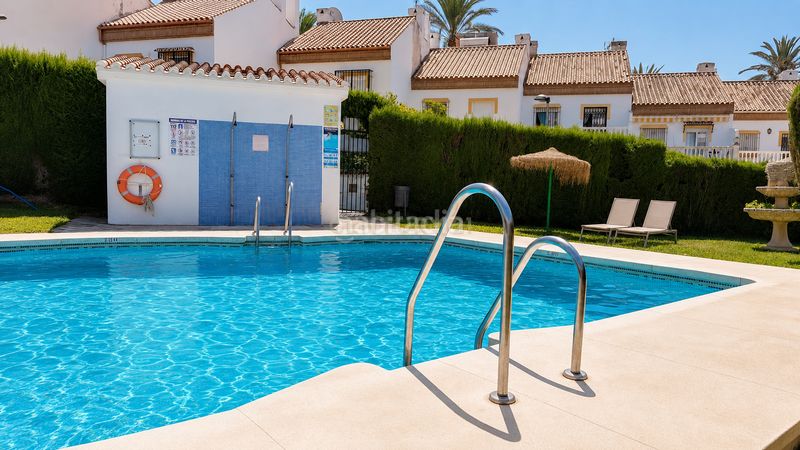 Foto d939740c-38c0-4acb-a01a-eed2c5fc4cb1. Casa adosada en av. las palmeras casa adosada en Parque de la Paloma Benalmádena