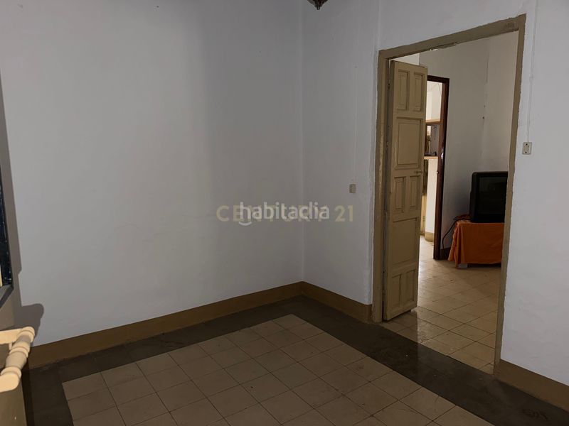 Foto 1b534d62-6c42-4293-844a-55e38db9f853. Edifici a calle atrás a Álora
