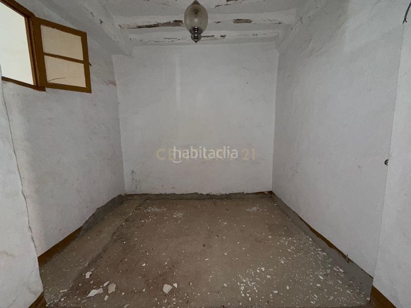 Foto 73a8f019-9da6-4a8d-a072-50bbd6db90e6. Edifici a calle atrás a Álora