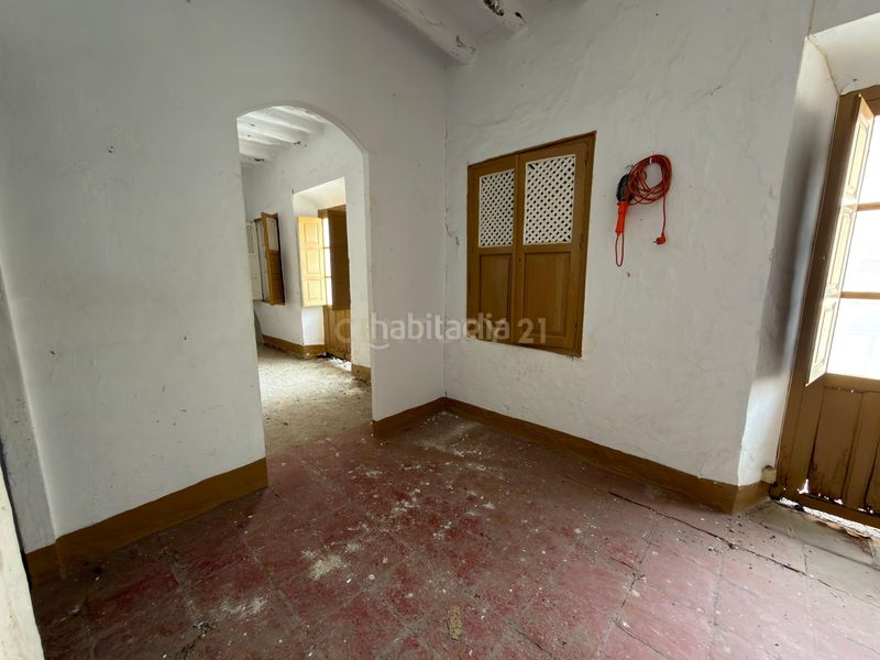 Foto 80693990-7b10-4ffb-bbaa-6a5c0b24c485. Edifici a calle atrás a Álora