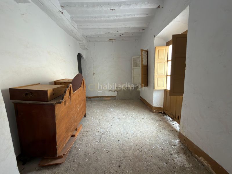 Foto b27a7efa-5759-4800-aa4d-4dbf3c26051e. Edifici a calle atrás a Álora