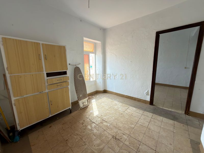 Foto c2240310-7720-463b-8632-dab82618fc19. Edifici a calle atrás a Álora