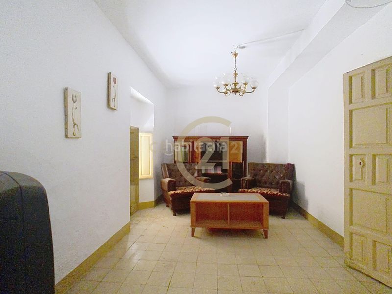 Foto a974e90f-7bd9-45f4-bca5-2723b127ee80. Edificio in calle atrás in Álora