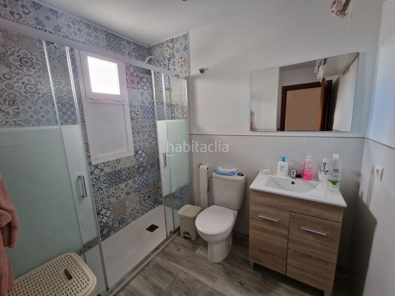 Foto 0655f85d-1096-4fa7-b91a-86720ce51da0. Casa adossada amb calefacció aparcament a Benacazón