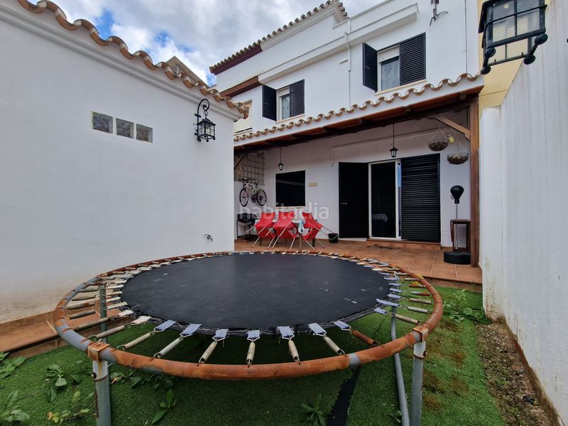 Foto 419d7f09-8f4d-4346-9f08-bee43f72bef2. Casa adossada amb calefacció aparcament a Benacazón