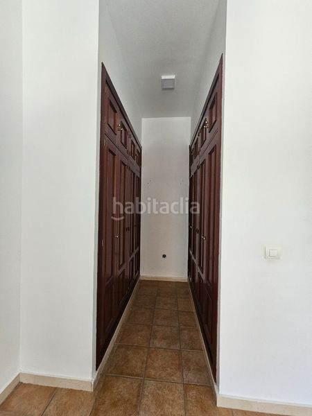Foto f013e440-7cac-47f6-b84b-ec1337b60bc0. Casa aparellada amb xemeneia aparcament piscina a Umbrete