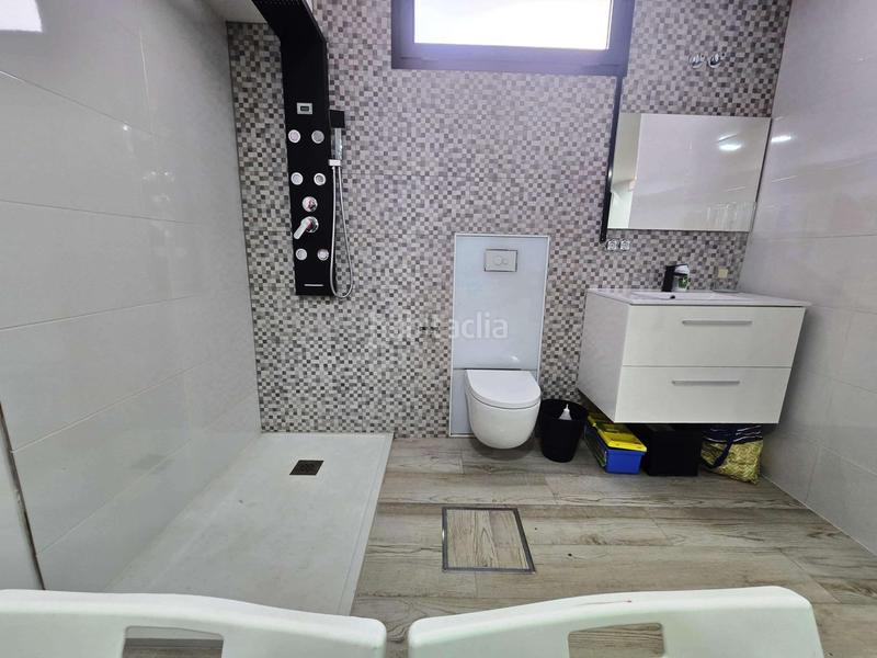 Foto 3bb7f1c4-ec93-4d7b-894d-16a5c726963c. Casa adosada en Huévar