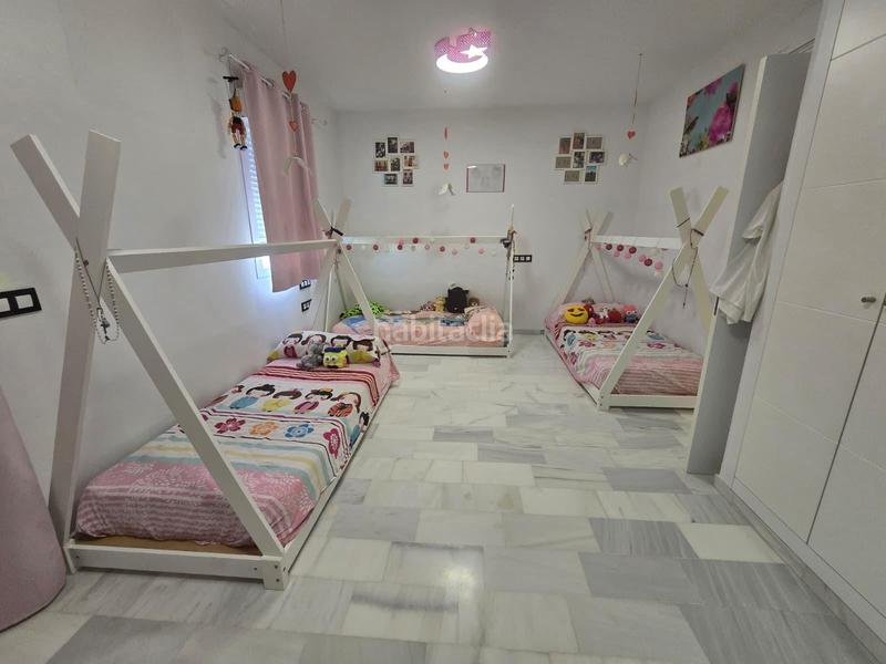 Foto afb5a7cc-e1ec-46fe-aa1b-44a1a9c598de. Casa adosada en Huévar