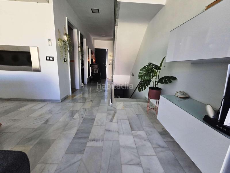 Foto cd19f930-e68a-4e41-a83a-eb75a3f7e740. Casa adosada en Huévar