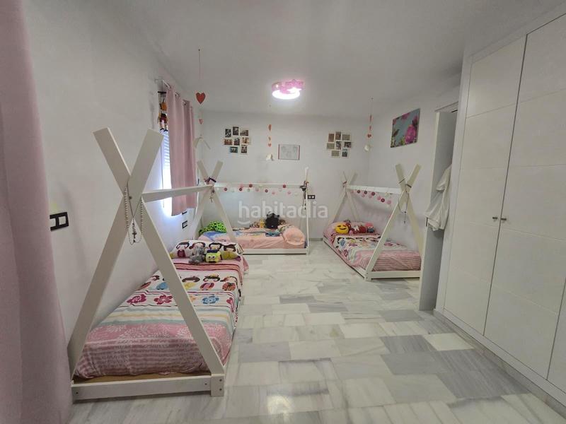 Foto e5f46d1c-ef7b-4eed-a653-b4106a43ba93. Casa adosada en Huévar