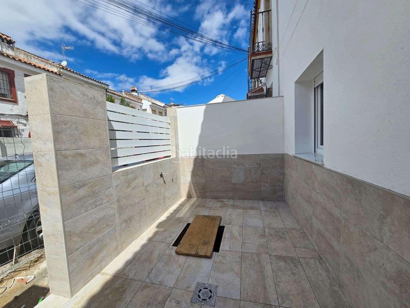 Foto f08e8840-91f4-41c0-a0d7-64a47cc9f9dd. Casa adossada a Centro Bormujos