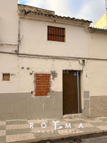 Foto 21fc6bc8-1f70-4853-b6cc-0b1a5ffd9ad0. Casa adossada a Saucejo (El)