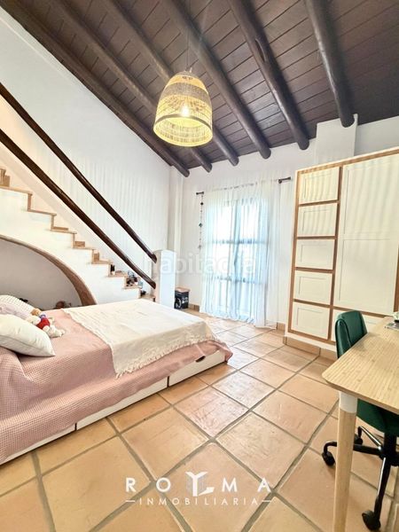 Foto a178c343-b7eb-424d-aa59-e62be8db07e7. Casa adossada amb calefacció aparcament piscina a Dos Hermanas
