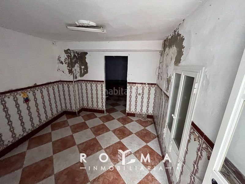 Foto 407368f0-217c-435b-866a-d3d8ee2b2659. Casa adossada a Arahal