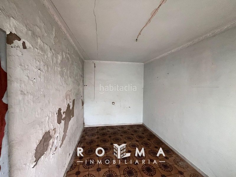 Foto a7251bb1-eca1-45ea-913a-123ba5cb6c82. Casa adossada a Arahal