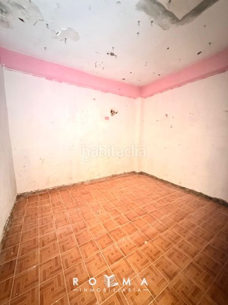 Foto eefafcef-2405-41fa-b38d-fb9bb5ddf8f4. Casa adossada a Palmete Sevilla