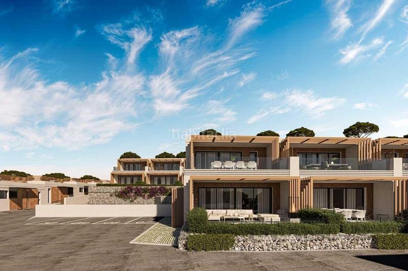 Foto bf5d9be1-5465-4fa0-98ca-d2353e277bf4. Casa adosada obra nueva espectaculares adosados 4 habitaciones piscina garage vistas al mar en Mijas