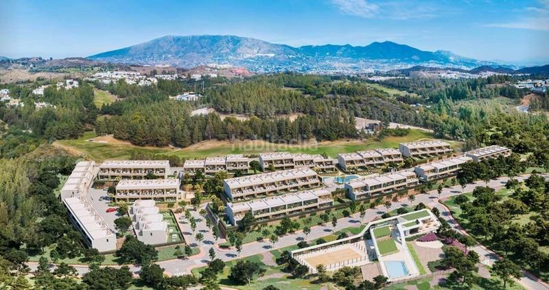Foto e098a53c-563a-45b9-82f6-7123d91ace32. Casa adosada obra nueva espectaculares adosados 4 habitaciones piscina garage vistas al mar en Mijas