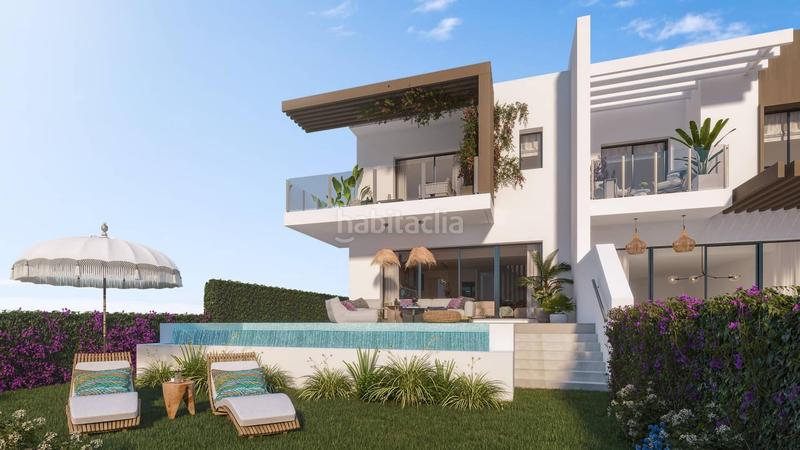 Foto fbecc123-da26-41f3-ab99-0d7c99b41c4b. Casa adosada adosado de 4 dormitorios y 3 baños con jardín privado. el chaparral, costa en Mijas