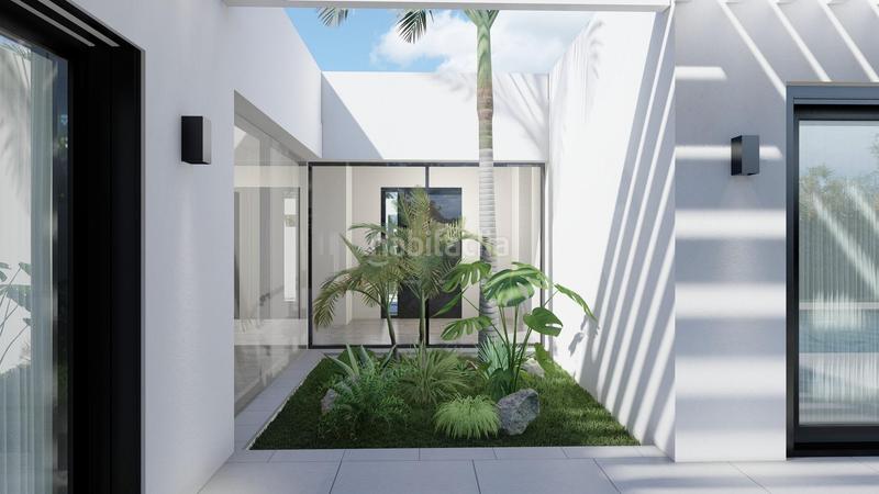Foto f8aabd99-dd03-4b13-8cd2-ddfb4e848a3a. Chalet villa de 4 dormitorios y 3 baños. espectaculares vistas panorámicas. sierra , pueblo en Mijas